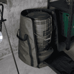 Portable Toyotomi heater in a carrying bag, ideal for camping, outdoor activities, and heat restoration.