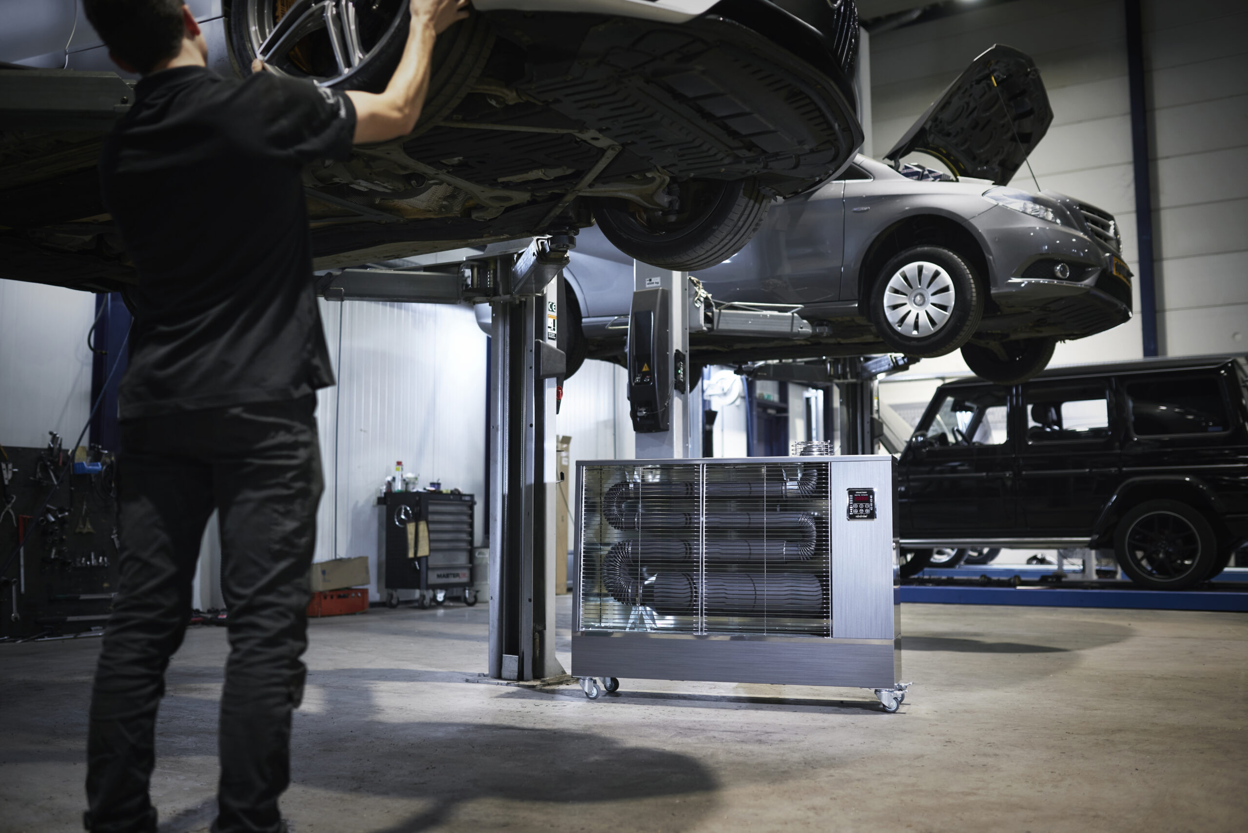 Toyotomi infrared heater being run on diesel in a garage